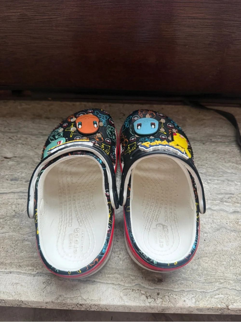CROCS Black Kids' Pokémon Character Clogs with Yellow Blue Orange Green Accents